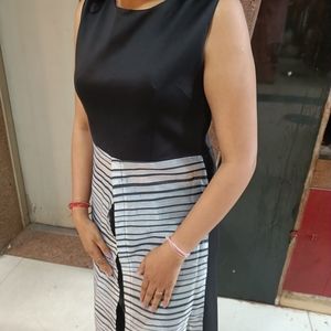 A one piece dress with front slit